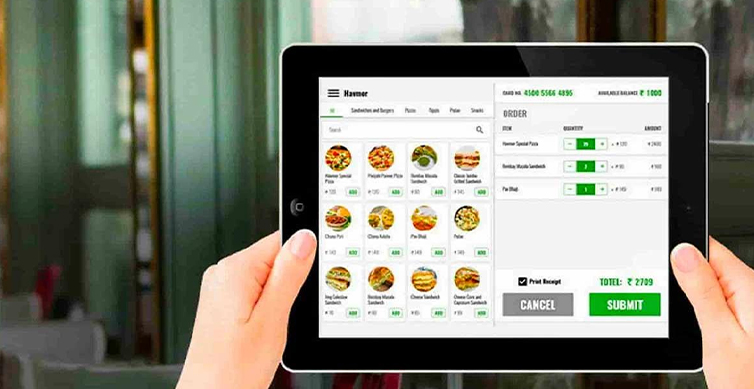 Modern restaurant using digital food ordering and restaurant management system 
